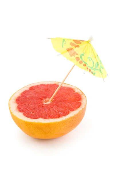 Grapefruit und Regenschirm — Stockfoto