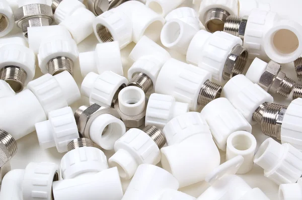 Acessórios de plástico branco — Fotografia de Stock