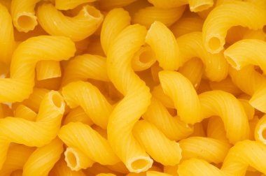 Close up of italian pasta - spiral shape clipart