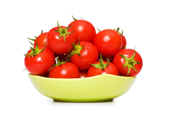 Islak bütün domates düzenlenmiş izole — Stok fotoğraf