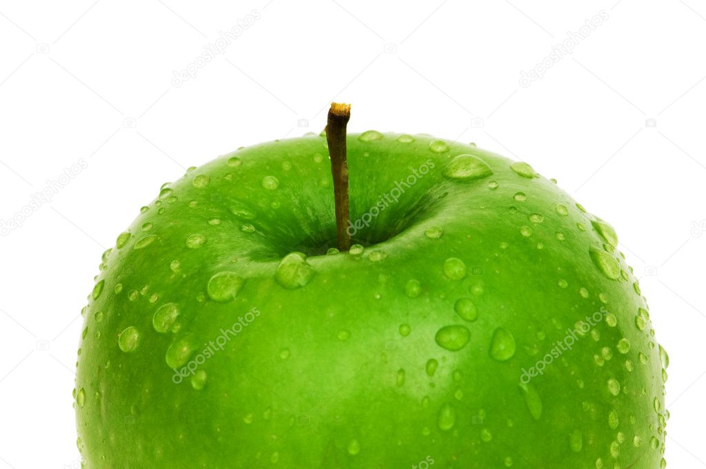 Green apple with dew isolated on white