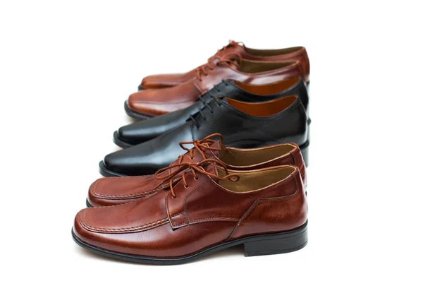 Varios zapatos masculinos aislados en el blanco —  Fotos de Stock