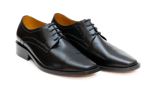 Sapatos pretos isolados no backgr branco — Fotografia de Stock