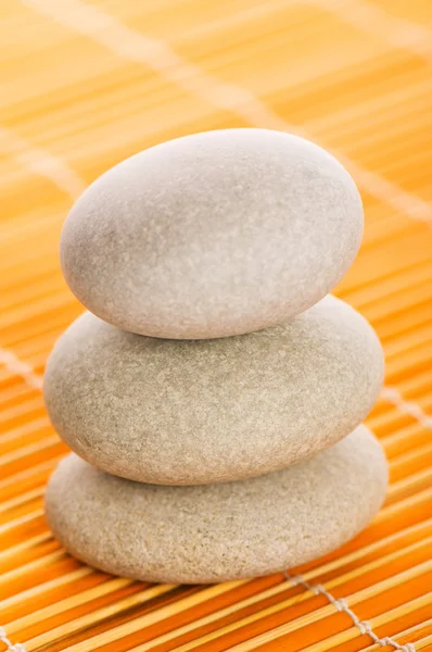 Stack of spa pebbles against blurred bac Stock Image