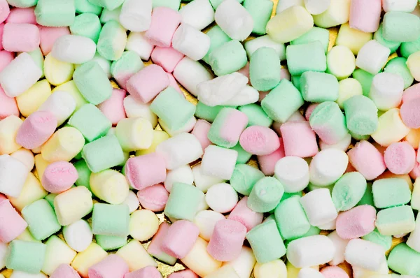 Różne suche kolorowe cukierki — Zdjęcie stockowe