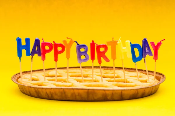 Happy birthday candles in the pie — Stock Photo, Image