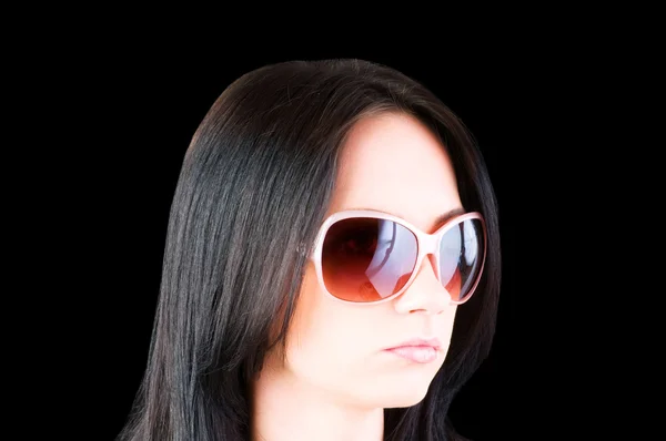 Молодая девушка в солнечных очках — стоковое фото