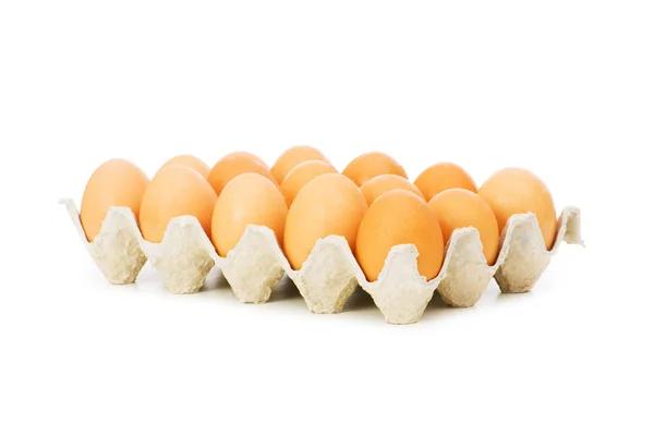Muchos huevos en el cartón —  Fotos de Stock