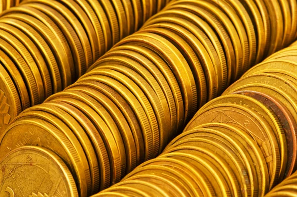 Primer plano de las pilas de monedas de oro — Foto de Stock