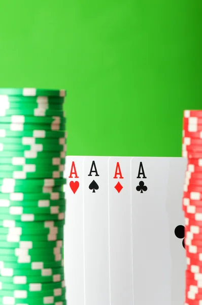 Casino chips and four aces — Stock Photo, Image
