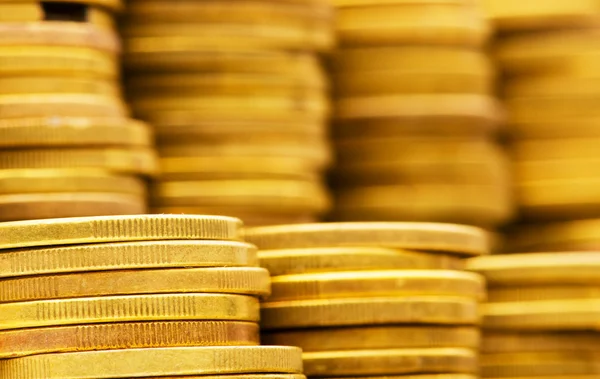Primer plano de las pilas de monedas de oro — Foto de Stock