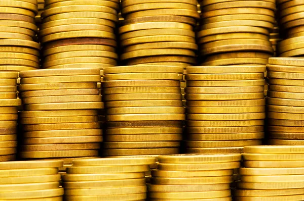 Pile of golden coins isolated — Stock Photo, Image