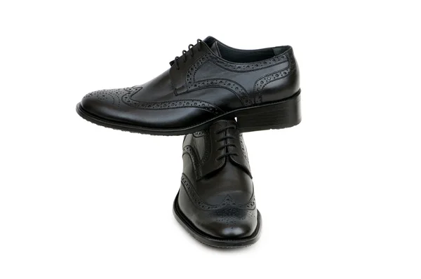 Elszigetelt a fehér fekete cipő — Stock Fotó