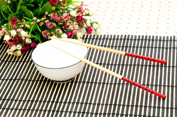 Chopsticks e tigela — Fotografia de Stock