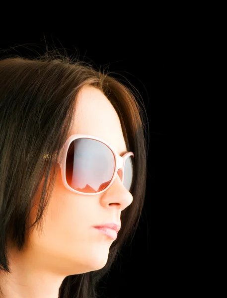 Młoda dziewczyna z na białym tle okulary — Zdjęcie stockowe