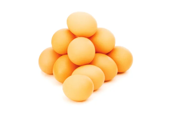 Ovos castanhos isolados no branco — Fotografia de Stock