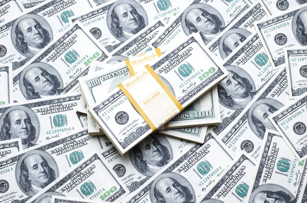 Stack dollar på pengar — Stockfoto