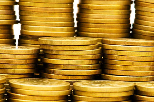 Close up van stapel van gouden munten — Stockfoto