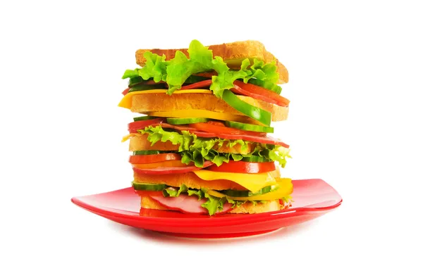 Plate with giant sandwich isolated — Stock Photo, Image