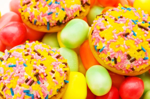 Édes sütemények és színes gumicsizma — Stock Fotó