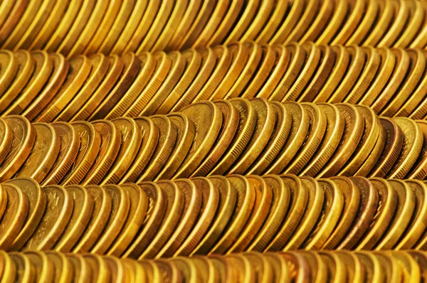 Az arany érme halmazaiból közelről — Stock Fotó