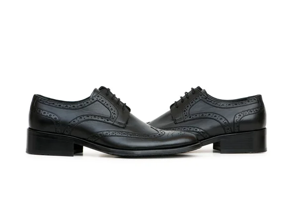Czarne buty na białym tle — Zdjęcie stockowe