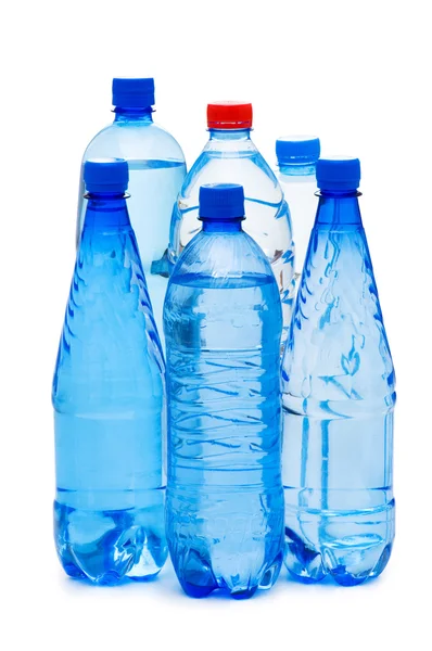Flessen water geïsoleerd op de witte — Stockfoto