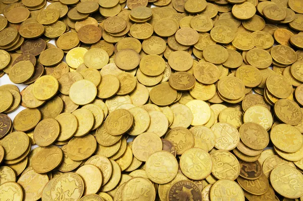 Montón de monedas de oro aisladas Fotos de stock