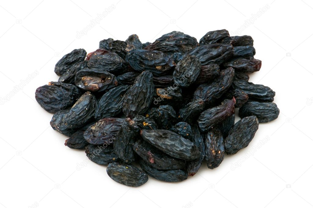 Black raisins isolated on the white