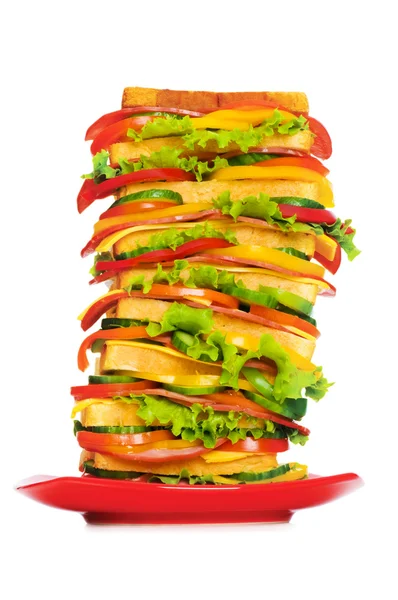 Plaat met gigantische sandwich geïsoleerd — Stockfoto