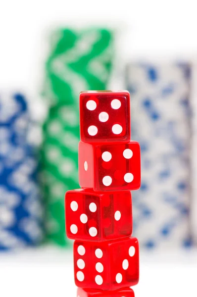 Stack of chips and dice isolated — Stock Photo, Image