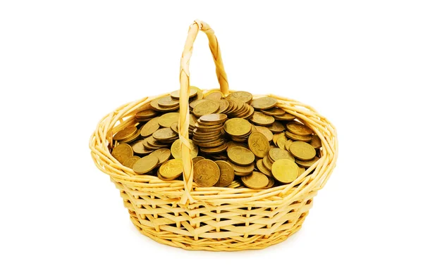 Basket full of coins isolated — Stock Photo, Image