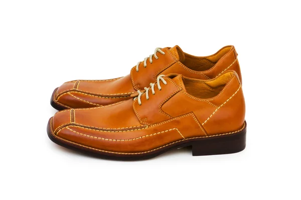 Orangefarbene Schuhe isoliert auf dem weißen — Stockfoto