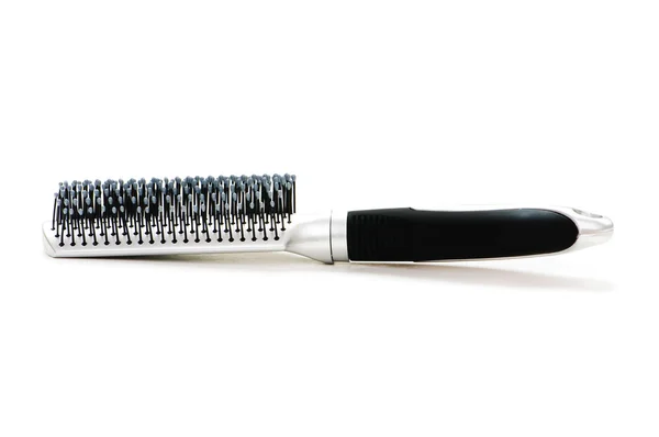 Üzerinde beyaz izole gümüş saç fırçası — Stok fotoğraf