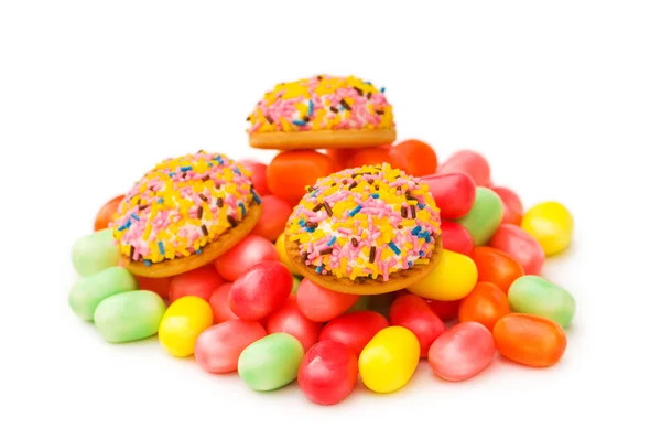 Pasteles dulces y encías coloridas — Foto de Stock