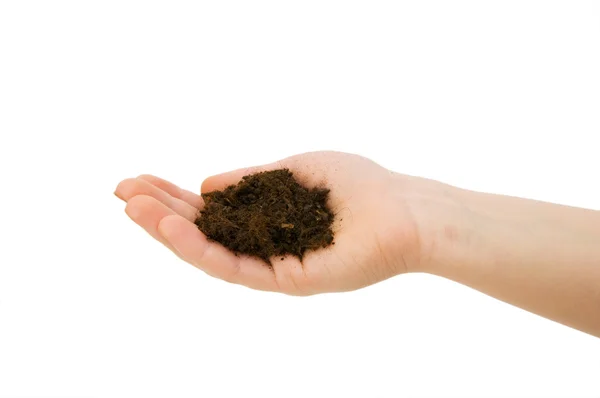 stock image Hand holding handful of soil isolated