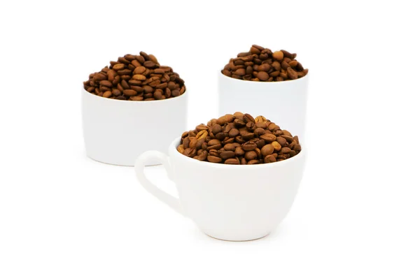 Xícara e grãos de café isolados — Fotografia de Stock