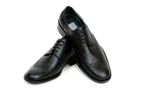Siyah ayakkabılar üzerinde beyaz izole — Stok fotoğraf
