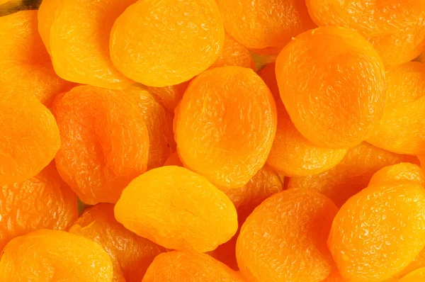Droge abrikozen gerangschikt — Stockfoto