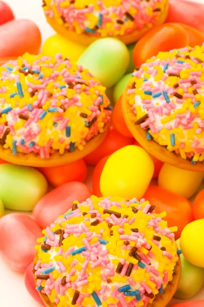 Pasteles dulces y encías coloridas — Foto de Stock
