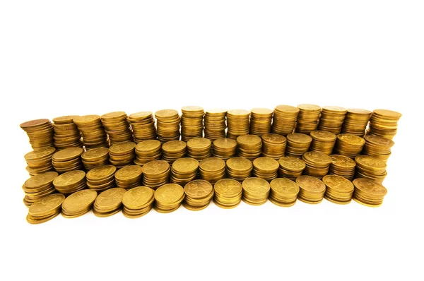 Pila di monete isolate sul bianco — Foto Stock