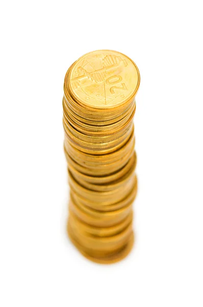 Stapel von Münzen isoliert auf dem weißen — Stockfoto