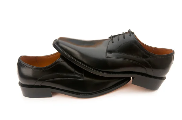 Чорні туфлі ізольовані на білому — стокове фото