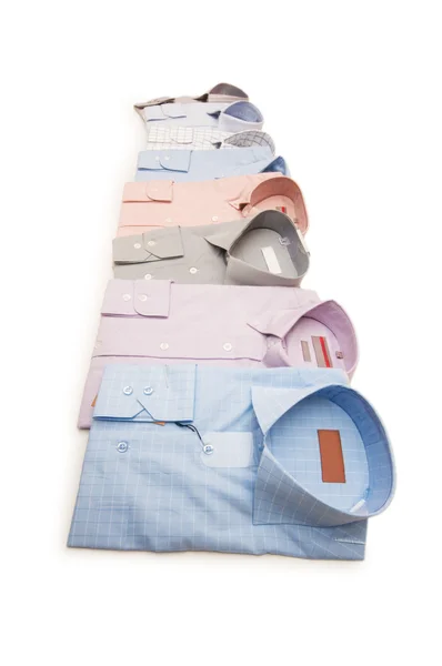 Различные рубашки, изолированные на белом — стоковое фото