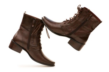 Brown boots isolated on the white clipart
