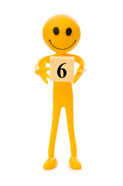 Smiley holding the number isolated — Stock Photo, Image