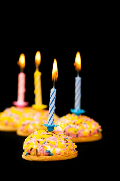 Cupcake e candele isolate — Foto Stock