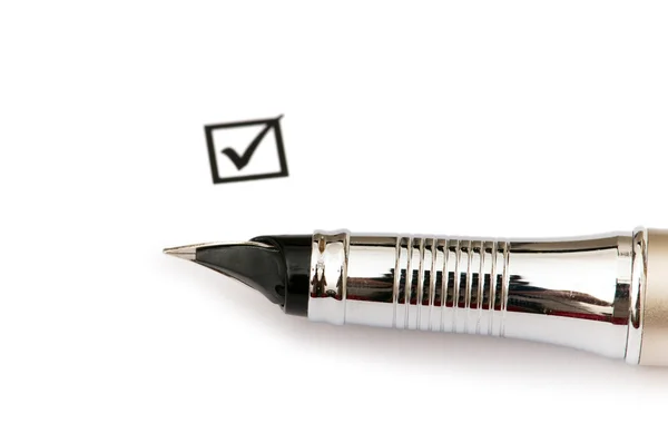 Pen and ticked tick box isolated — Stock Photo, Image