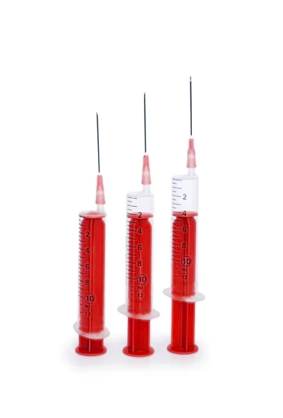 Three syringes isolated on the white — Stock Photo, Image