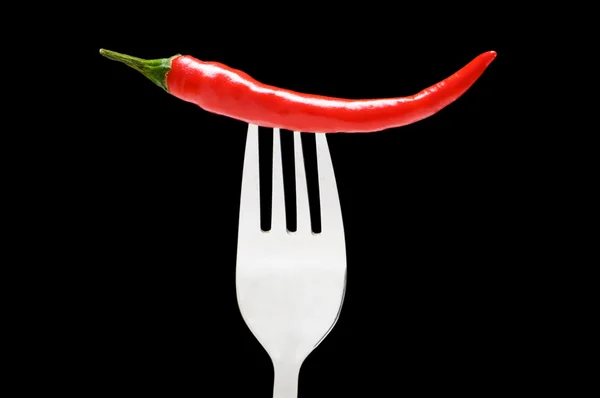 Röd paprika isolerat på svarten — Stockfoto